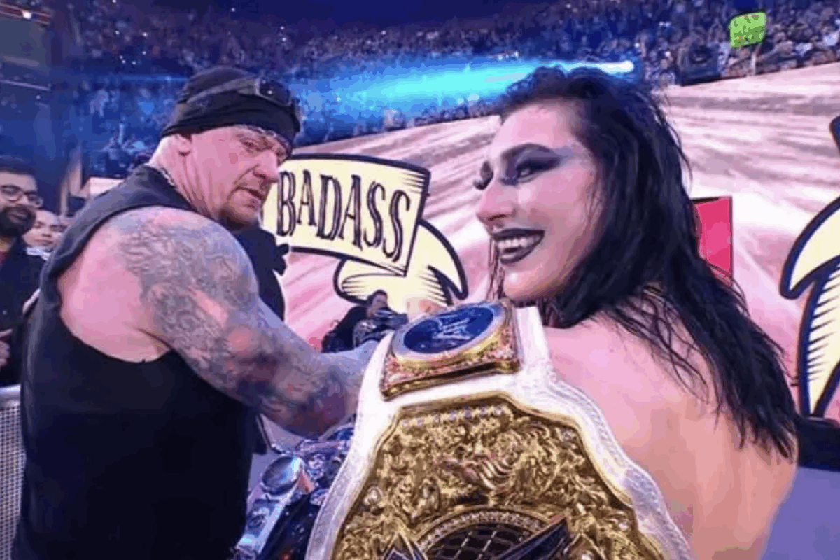 Undertaker as American Bad Ass and Rhea Ripley celebrate on Raw on Netflix